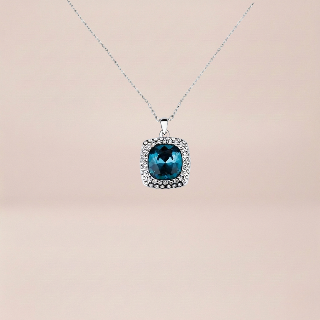 The Cushion-Cut Solitaire Halo Pendant