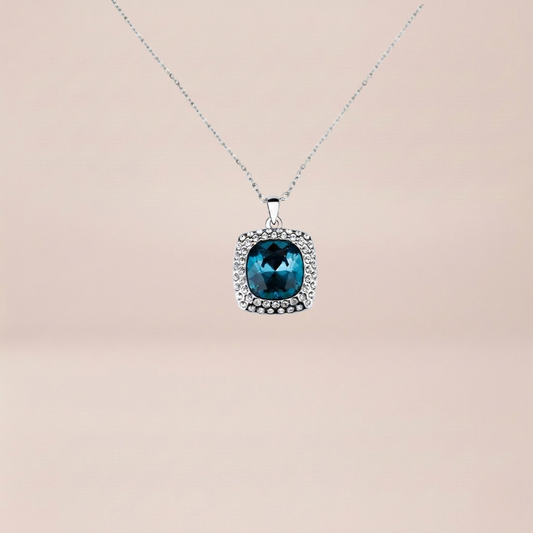 The Cushion-Cut Solitaire Halo Pendant