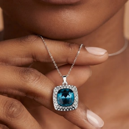 The Cushion-Cut Solitaire Halo Pendant